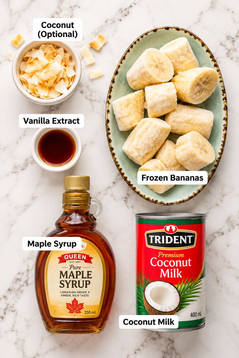 Ingredients for coconut shake with frozen bananas, coconut milk, maple syrup and vanilla.