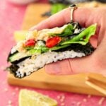 Handheld sushi wrap: Easy nori sushi wrap filled with creamy chickpeas, rice, avocado, and crunchy vegetables.