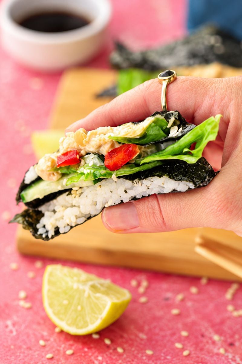 Handheld sushi wrap: Easy nori sushi wrap filled with creamy chickpeas, rice, avocado, and crunchy vegetables.