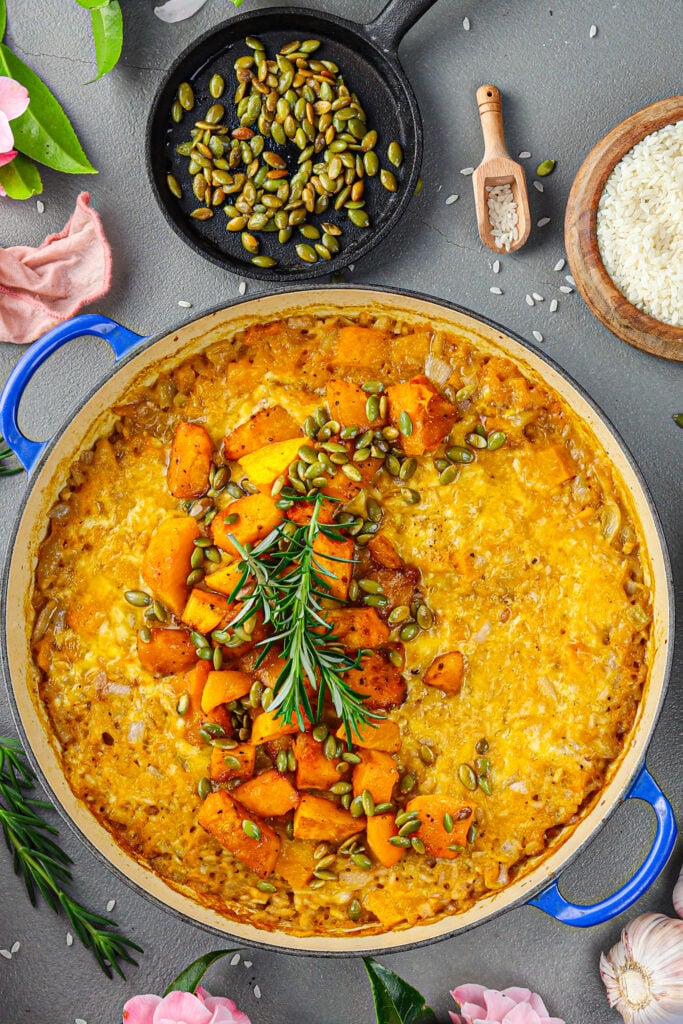 Pumpkin baked risotto garnished with pumpkin and rosemary.