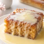 South African malva pudding with warm cream sauce.