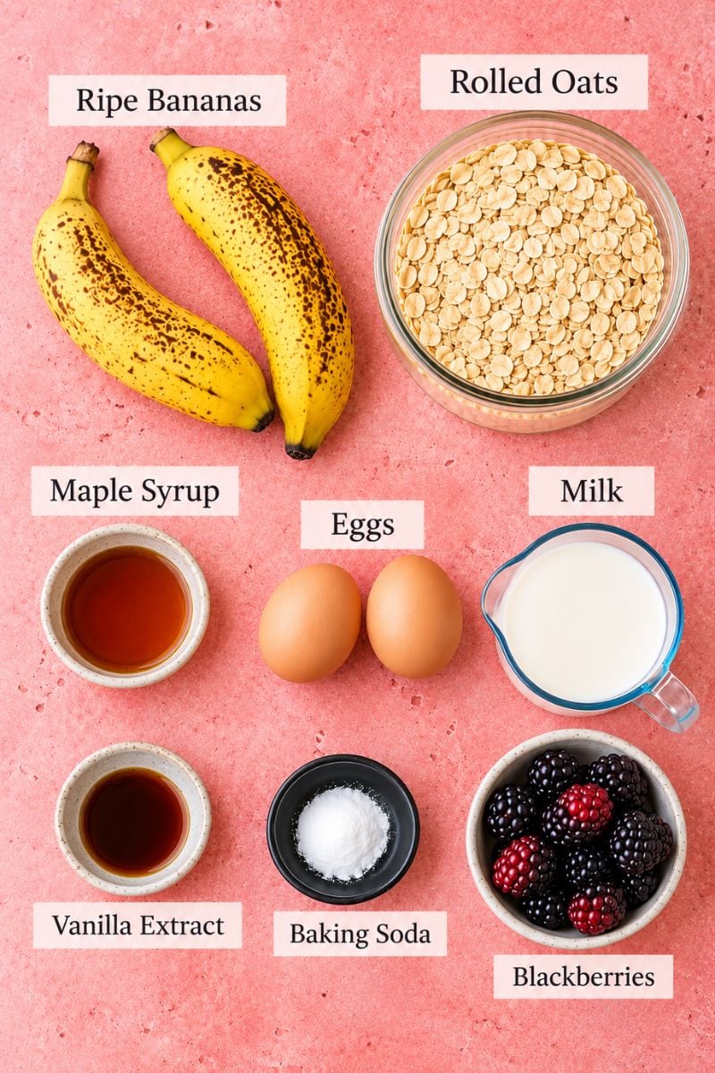 Ingredients for banana blackberry oatmeal muffins with oats bananas milk eggs honey and blackberries.