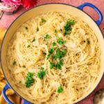 Creamy spaghetti Alfredo with Parmesan cheese and fresh parsley.