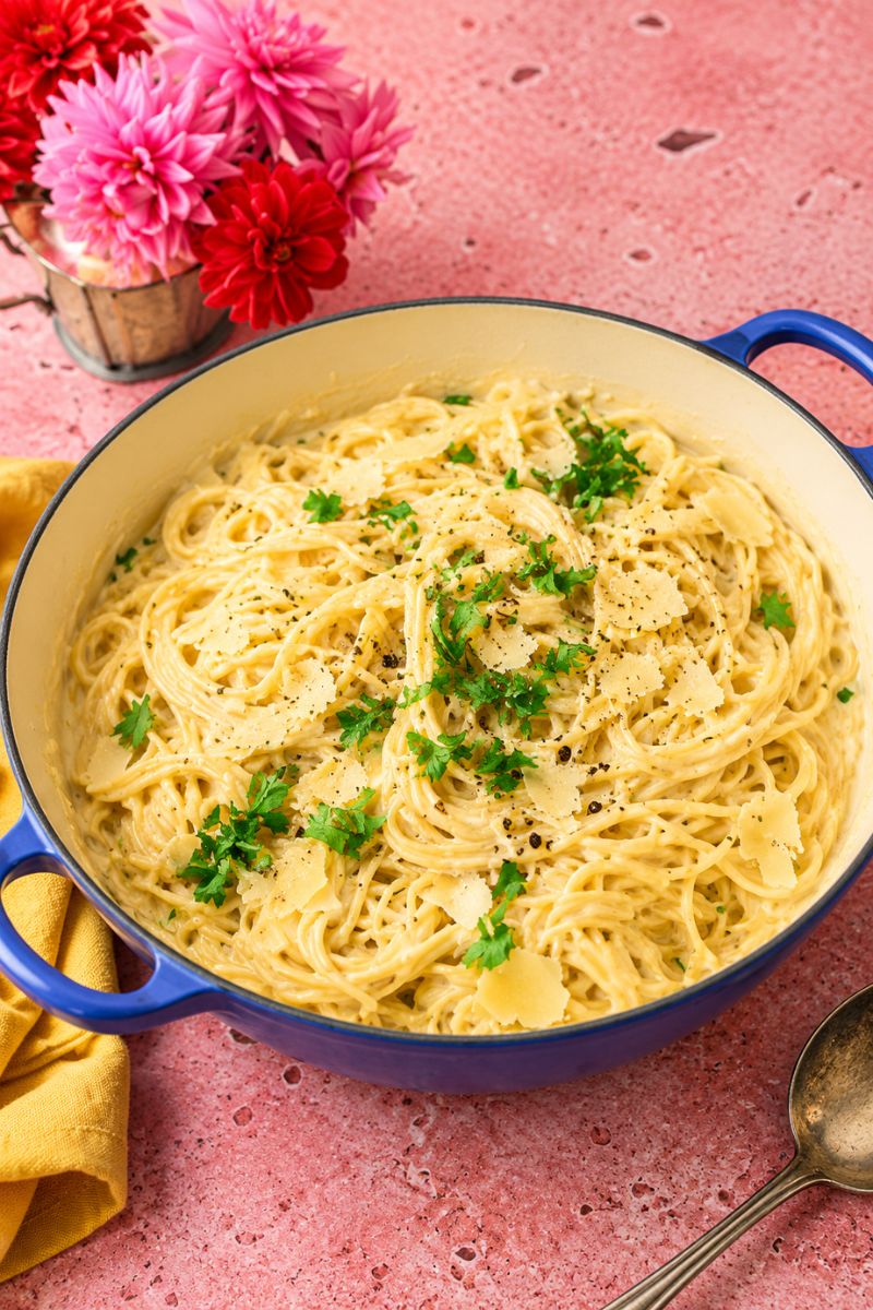 Creamy spaghetti Alfredo with Parmesan cheese and fresh parsley.
