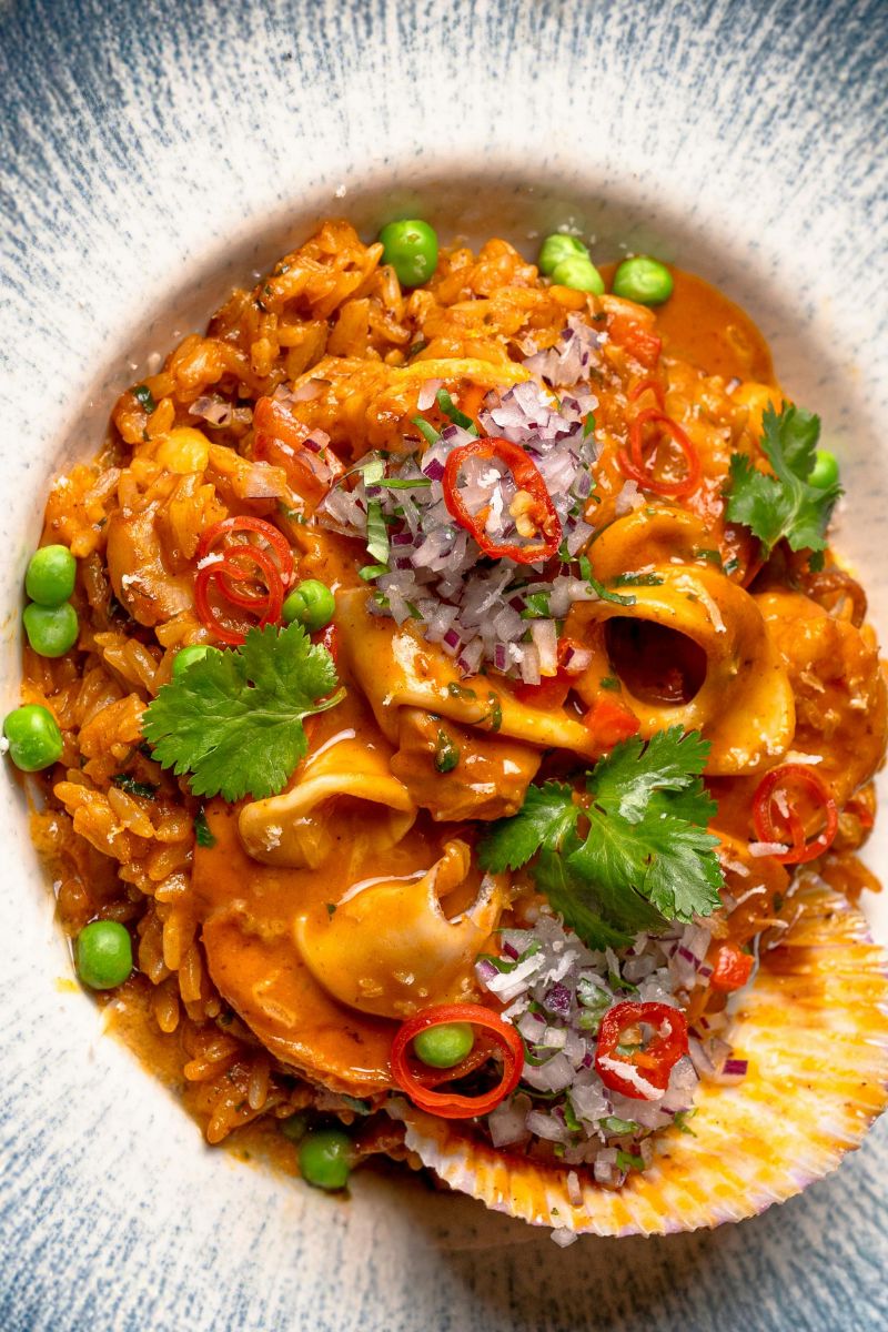 Pasta made with saffron. Saffron gives it a yellow color.