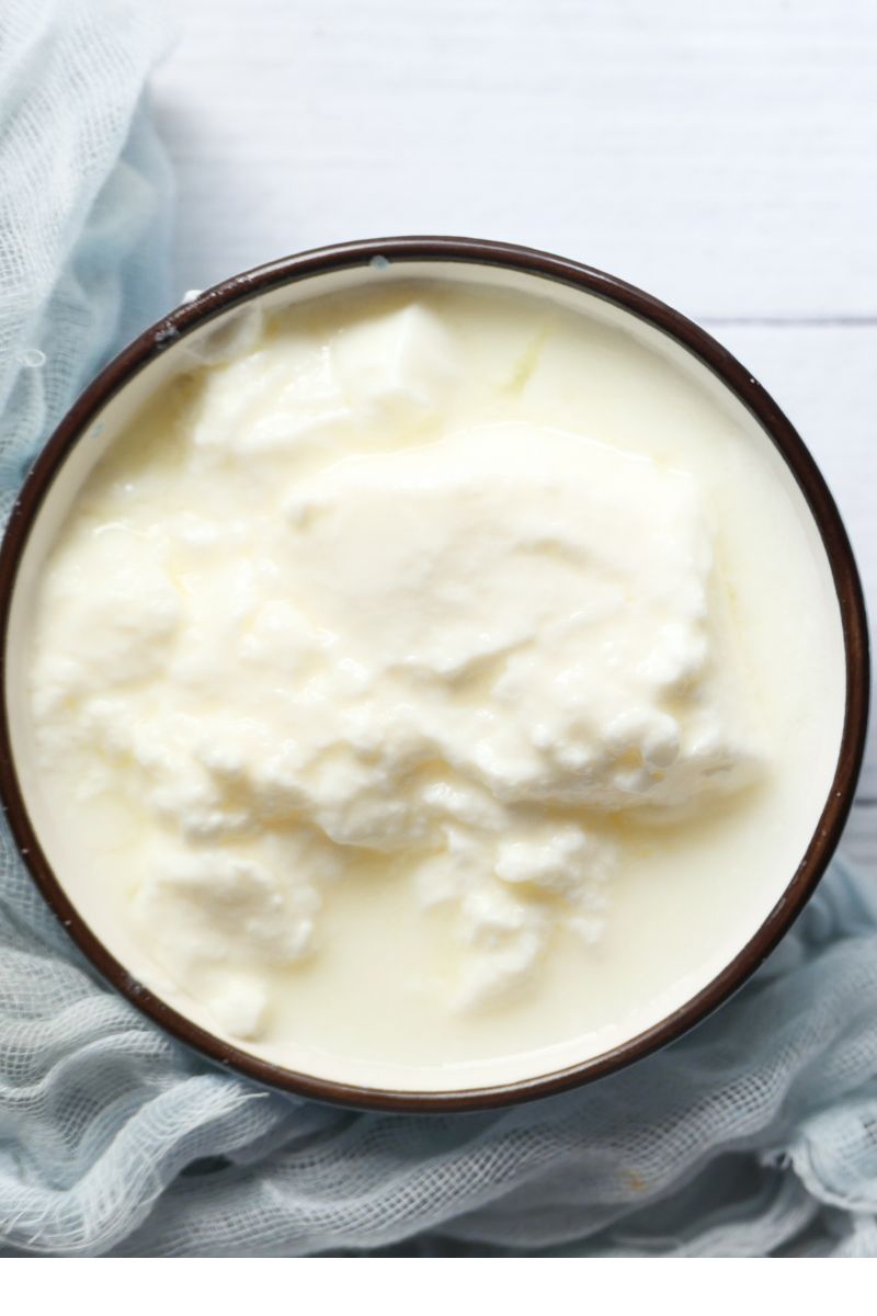 A bowl of Greek yogurt which can be used as a vegetable oil substitute.