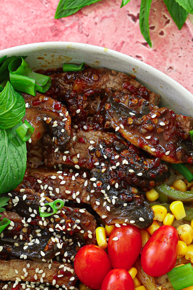 A close up picture of the sticky Asian beef.