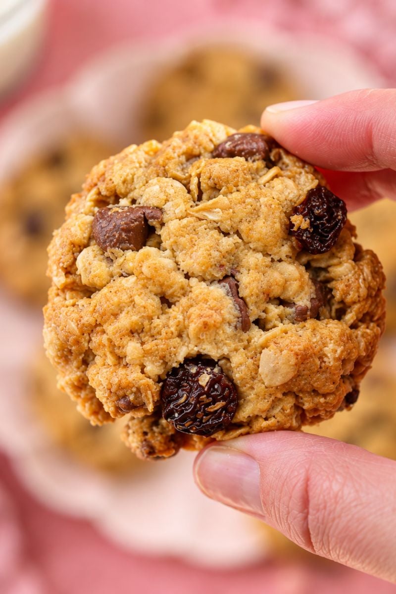 Homemade oatmeal raisin chocolate chip cookies with golden edges and a soft, chewy texture.