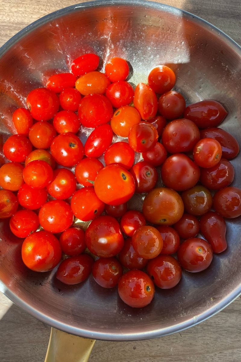 Cherry tomatoes in a pan.