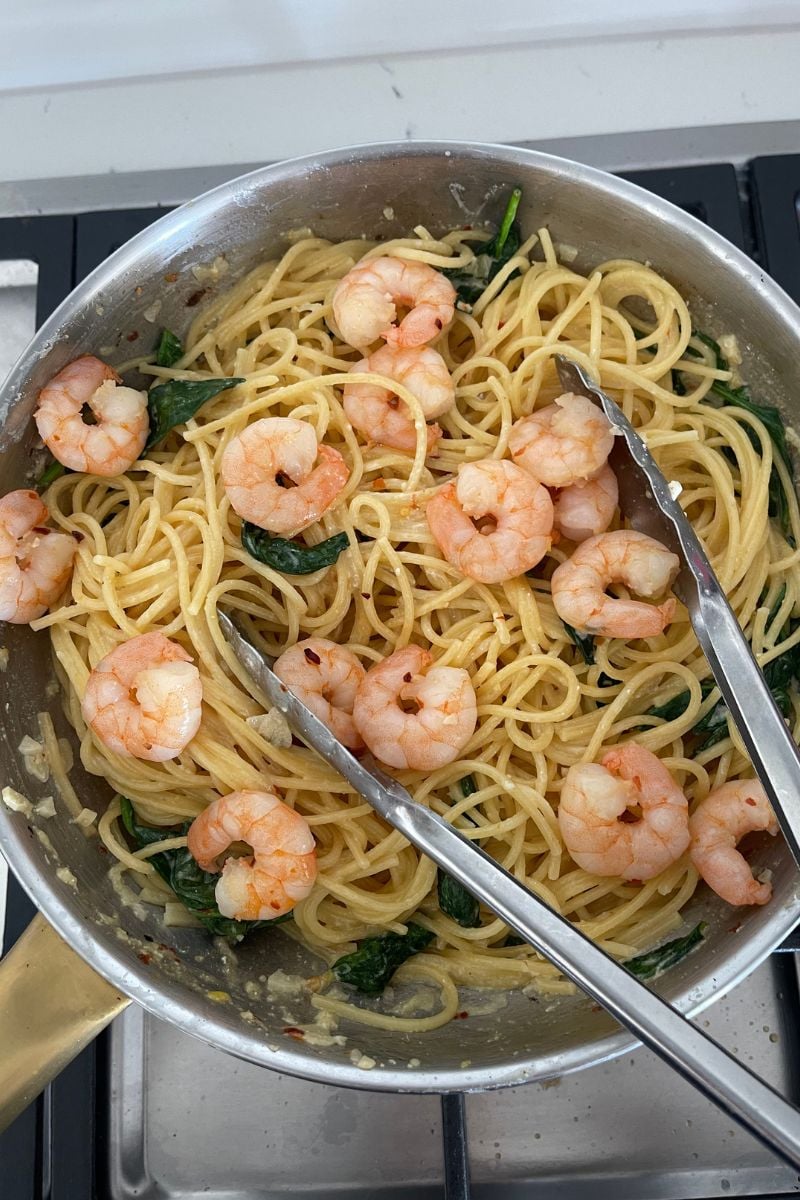 Add the prawns and pasta. 