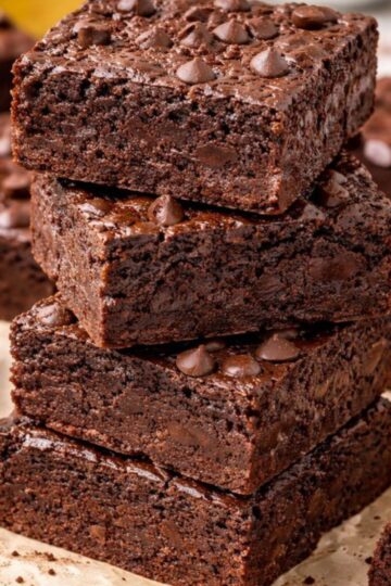 Three ingredient chocolate brownies in a stack.