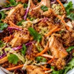 Crispy rice salad with chicken, crunchy coleslaw and golden crispy rice
