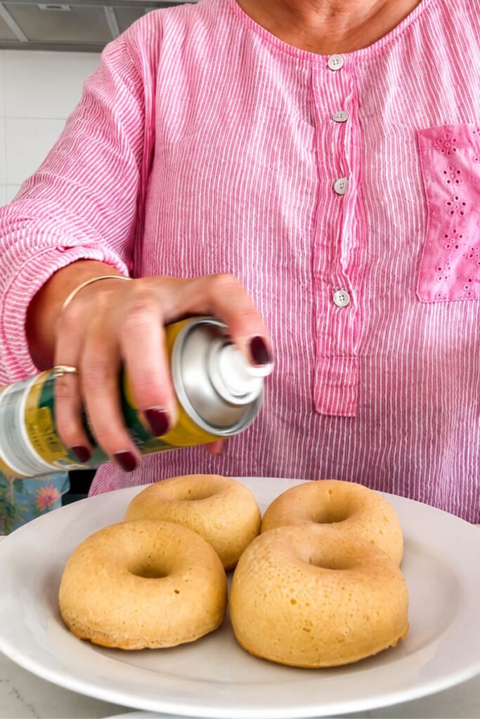 Spraying with cooking oil.